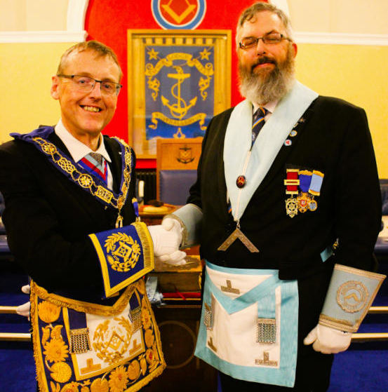 W Bro David Cowley greets RW Bro Martin Blackburn